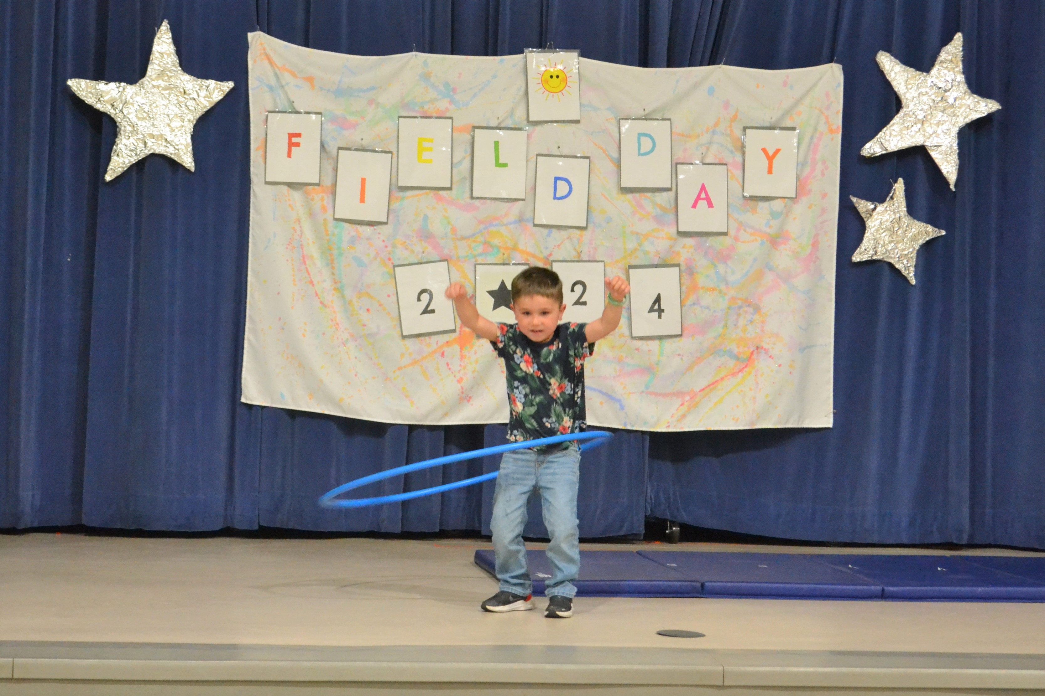 Student jumps rope on stage