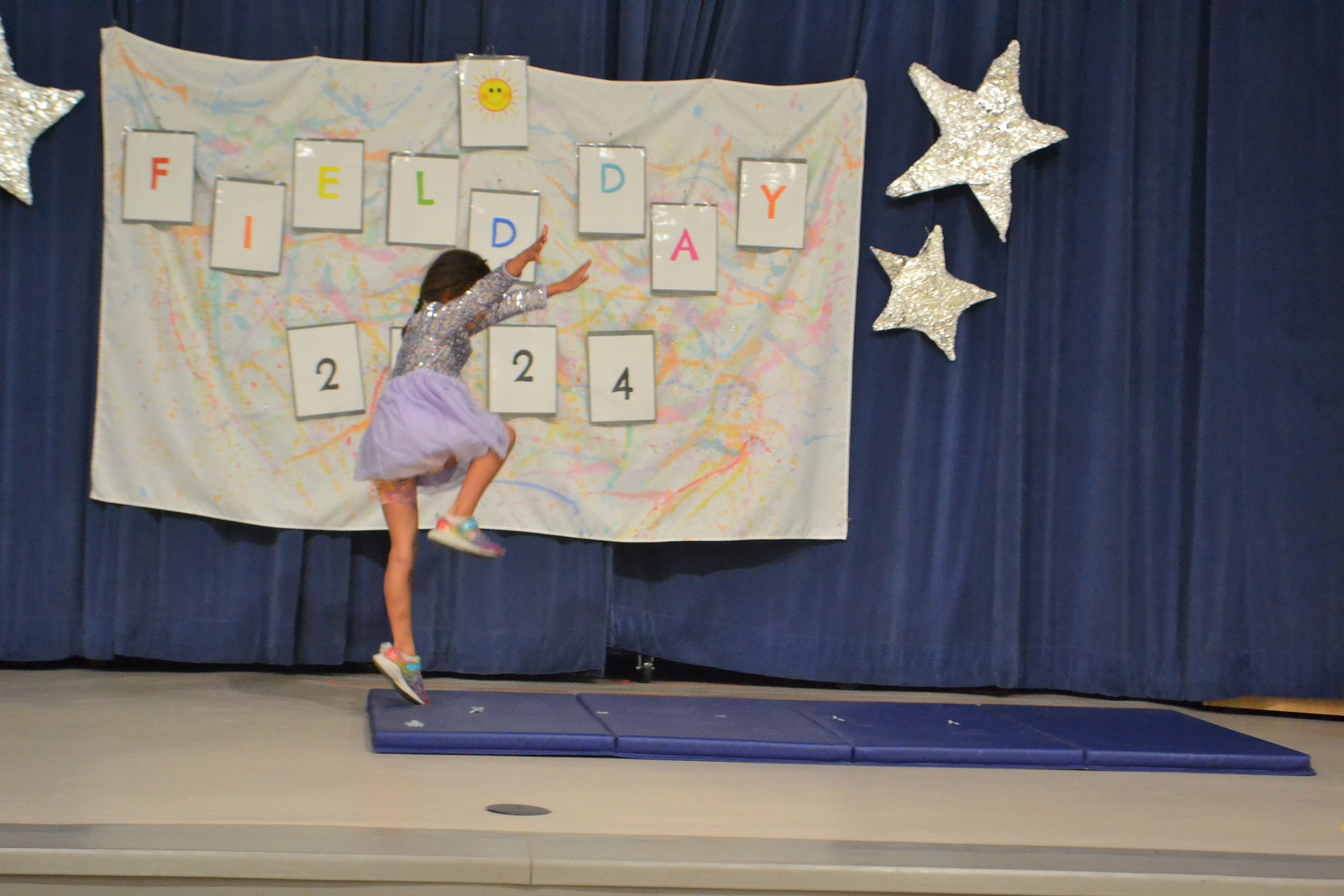 student prepares to do cartwheel