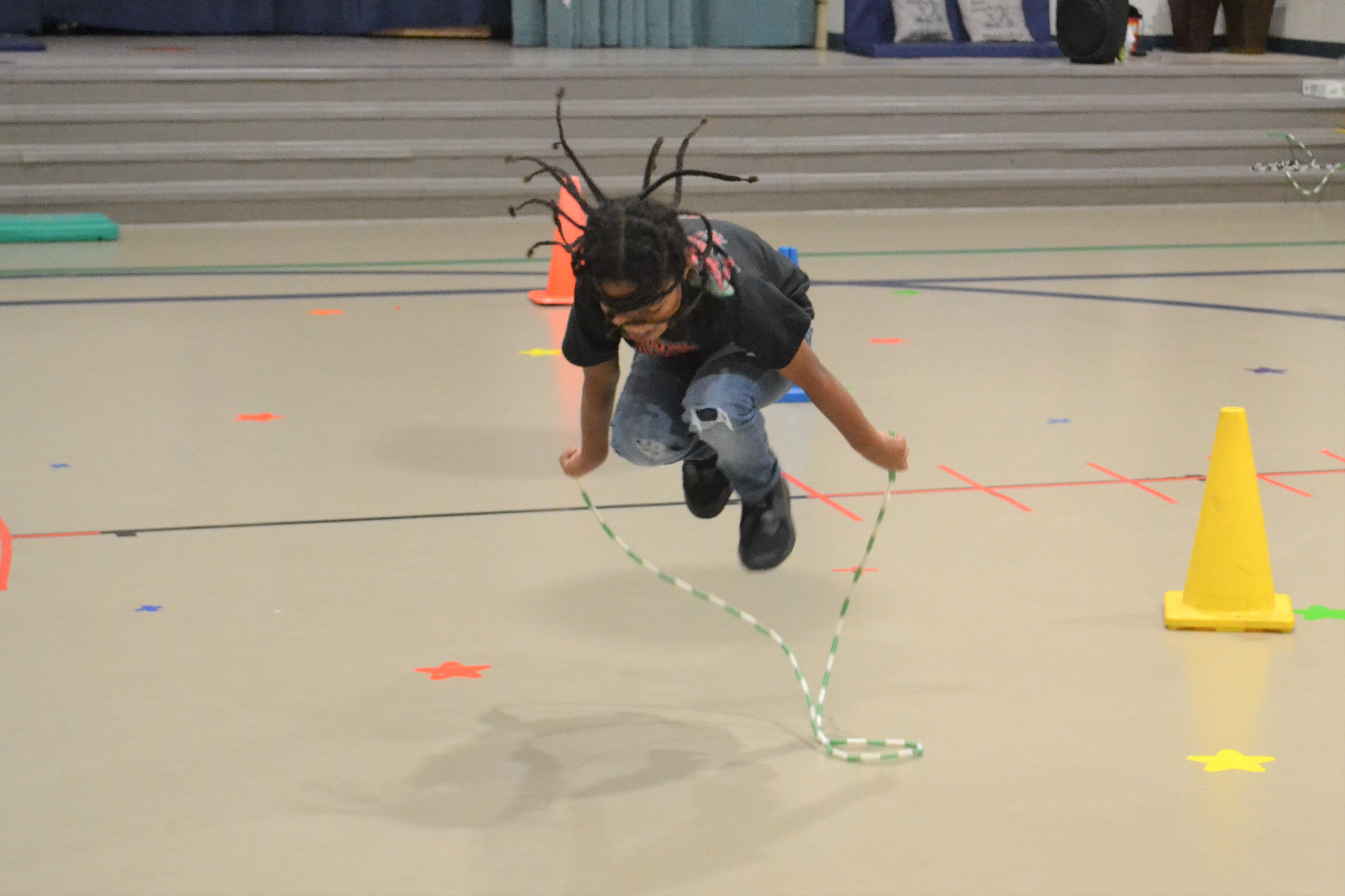 student jumping rope