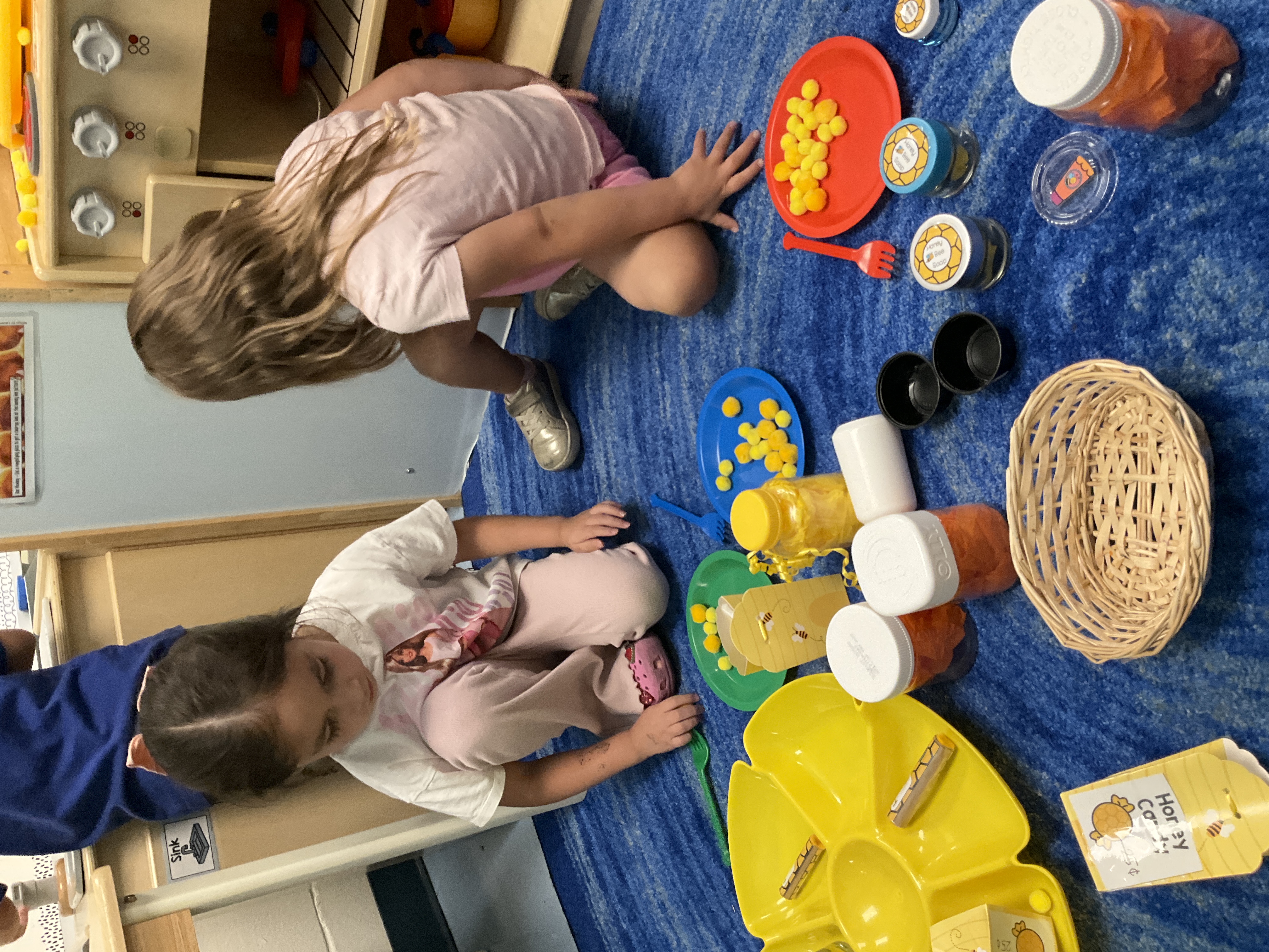 Pre K students learn about harvesting, selling, and purchasing honey